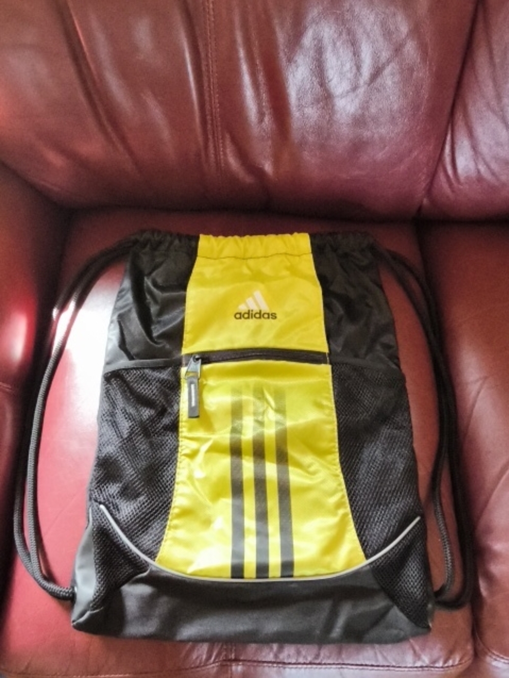 Adidas Black and Yellow Drawstring Backpack with Front Zip Pocket